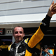 Kubica, displaying his arm. Photo credit: Getty Images